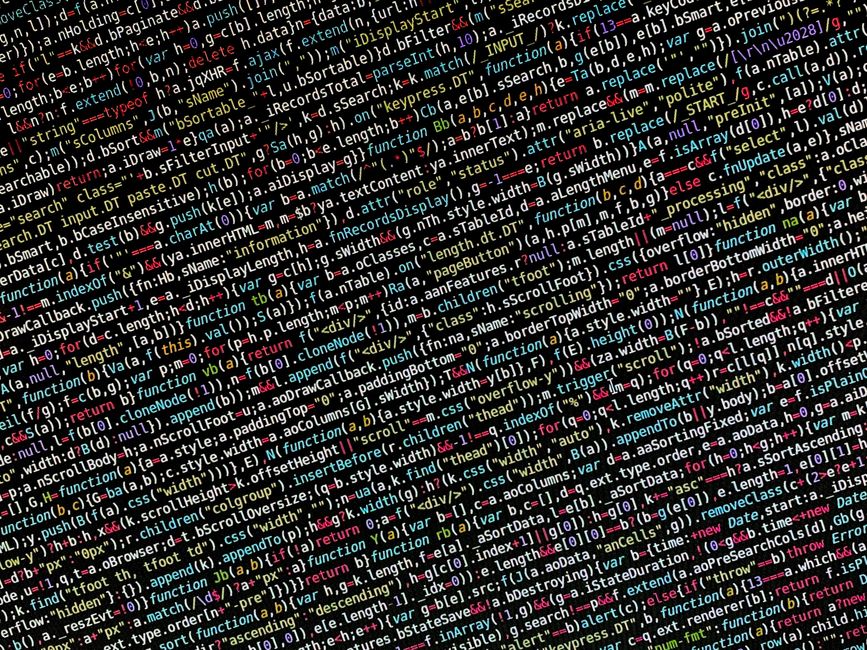 A computer screen displays a code editor open to an HTML file named index.html. The code includes HTML tags such as <html>, <head>, <title> indicating the page title, and <meta>